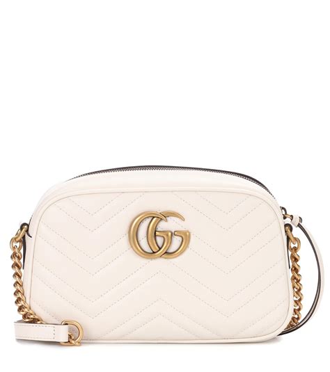 white gucci marmont bag.